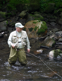 fly-fisherman-wearing-fishing-vest-by-lynnette.jpg