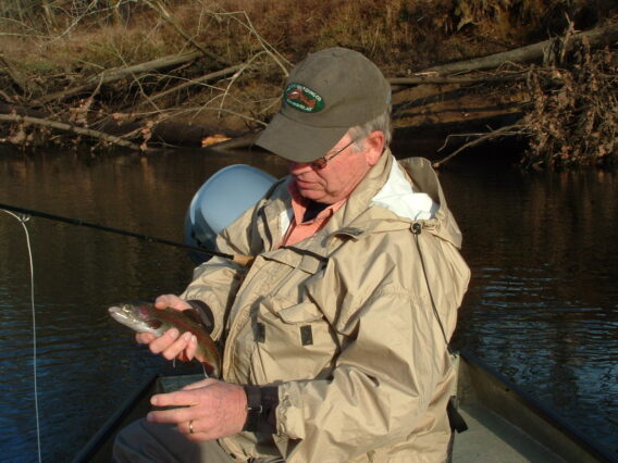 Dan about to release a rainbow trout.